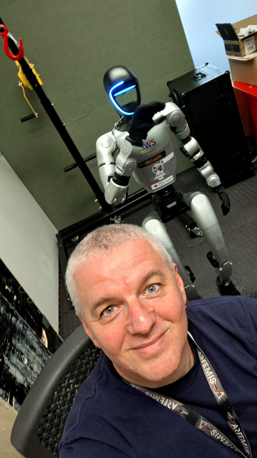 Unitree G1 humanoid in a development lab setting